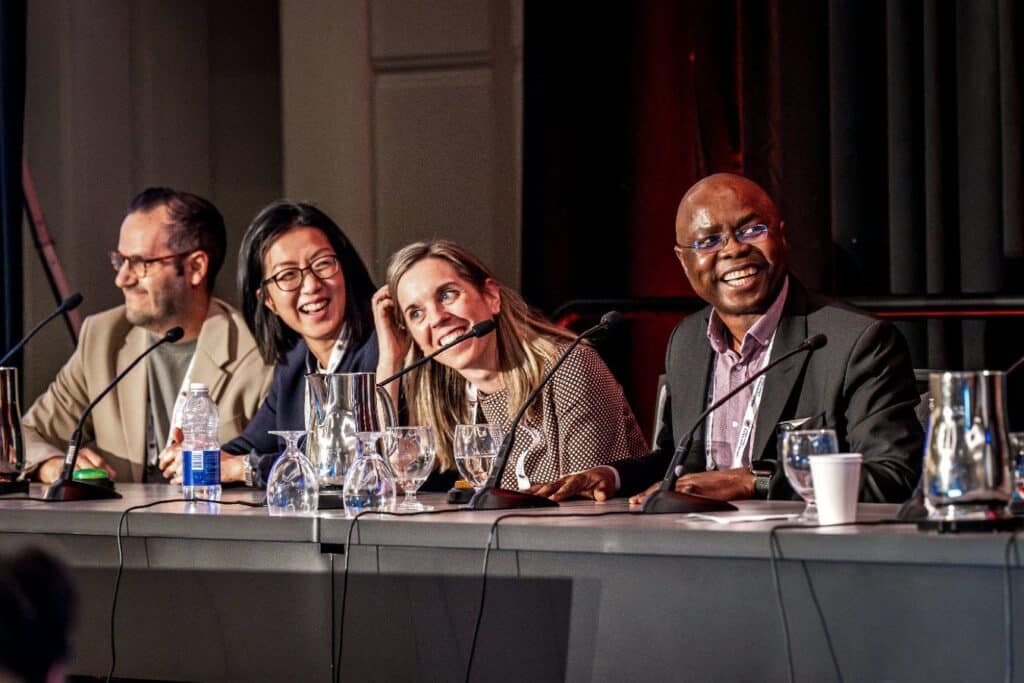 Panel discussion with seated speakers.